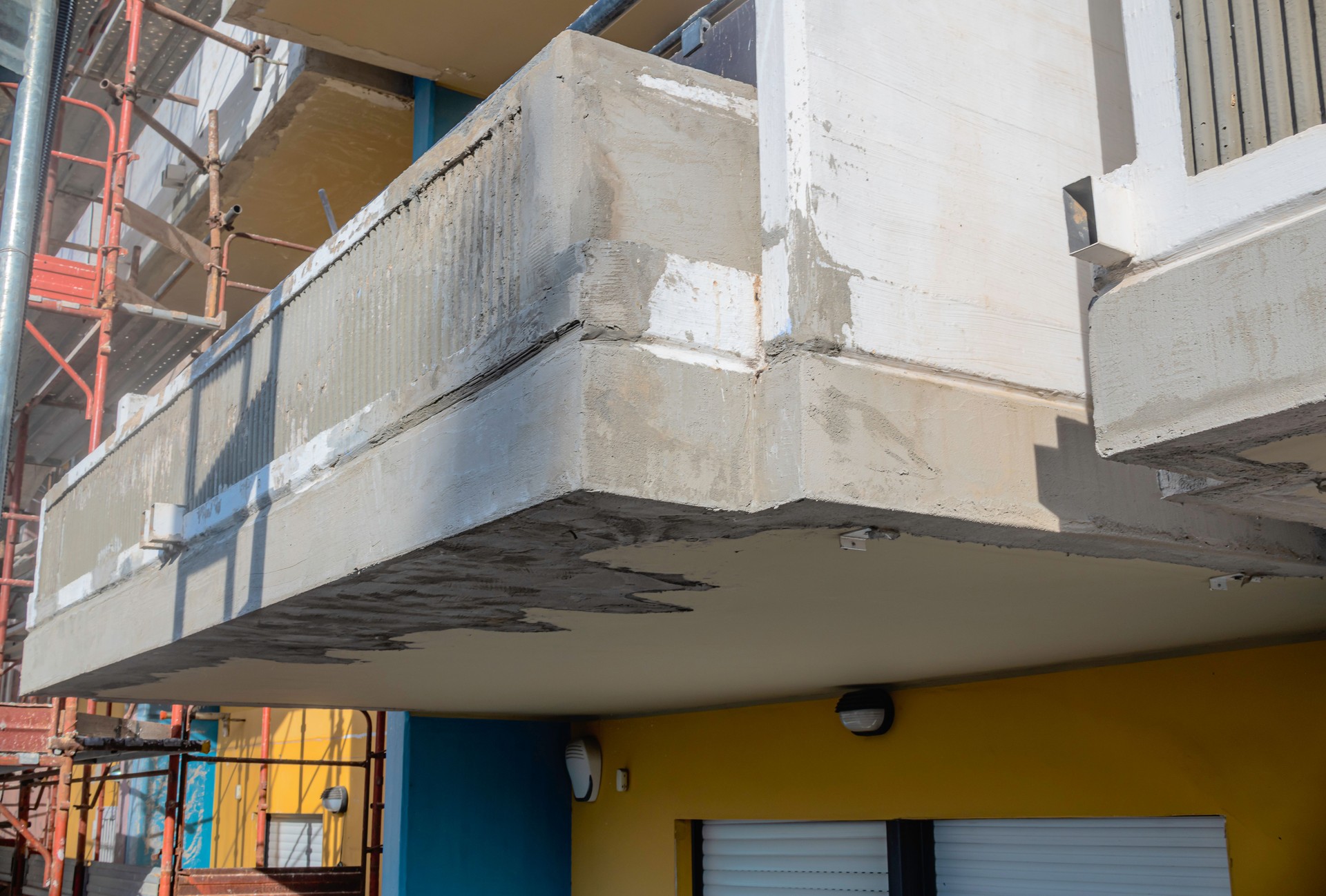 Balconies of condominium facade repaired after degradation and cracks in the reinforced concrete structure